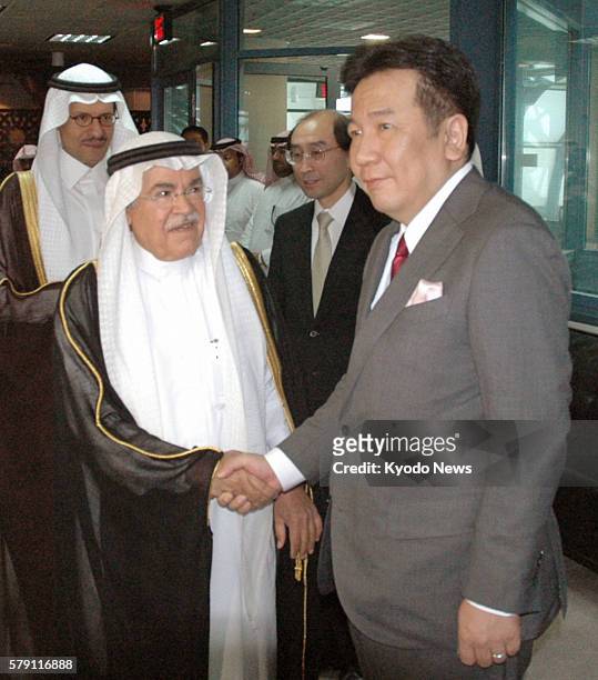 Saudi Arabia - Saudi Oil Minister Ali al-Nuaimi and Japanese Economy, Trade and Industry Minister Yukio Edano shake hands in Riyadh on Oct. 10, 2011....