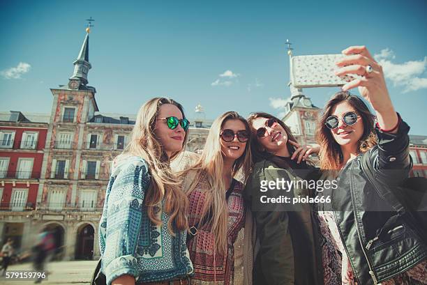 tourist woman selfie in plaza major, madrid - madrid stock pictures, royalty-free photos & images