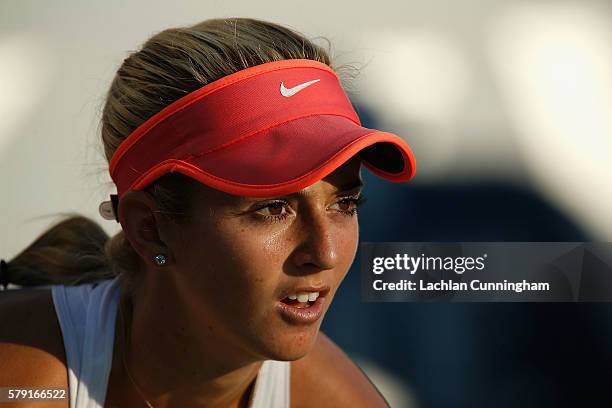 Catherine Bellis of the United States looks on as she competes against Venus Williams of the United States during day five of the Bank of the West...