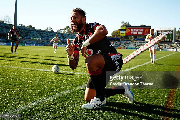 Manu Vatuvei of the Warriors celebrates after scoring a try during the round 20 NRL match between the Canberra Raiders and the New Zealand Warriors...