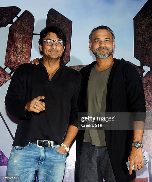 Indian Bollywood actor Ajinkya Deo and his brother, filmmaker Abhinay Deo pose at the screening of Colors TV's Indian version of '24' Season 2 in...