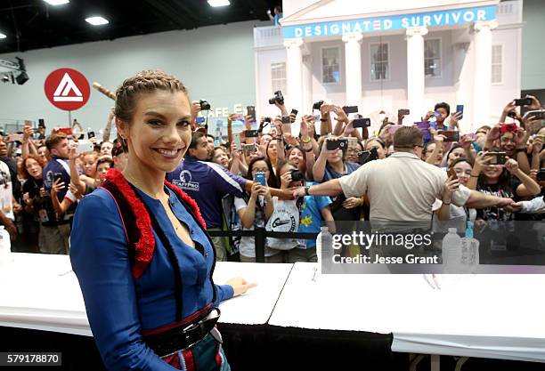 Actress Lauren Cohan signs autographs during AMC's 'The Walking Dead' Panel at Comic-Con International 2016 at San Diego Convention Center on July...