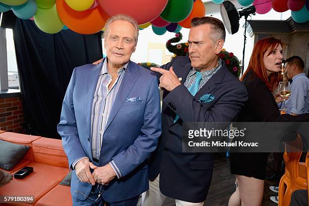 Actors Lee Majors and Bruce Campbell attend the STARZ San Diego Comic-Con Cocktail Party on July 22, 2016 in San Diego, California.