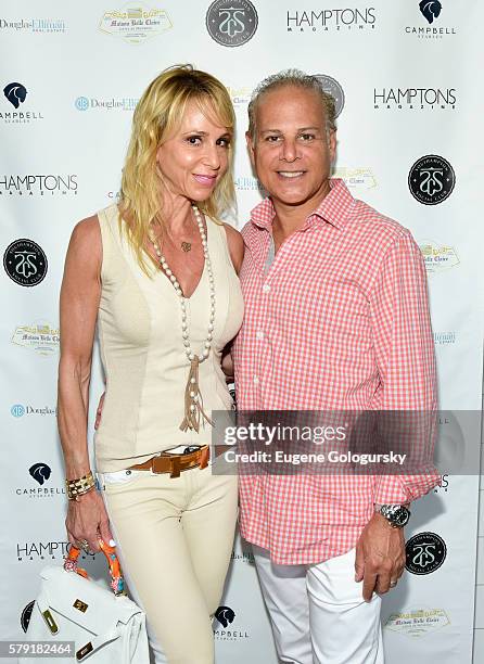 Gail Greenberg, and Dr. Stephen Greenberg attend the Douglas Elliman & Hamptons Magazine Celebrate Summer at Campbell Stables on July 22, 2016 in...