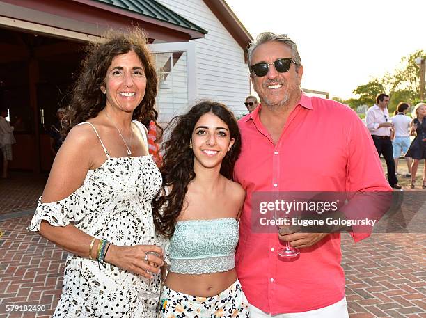 Alfonso Costa, ÊMary Costa, Êand Alexandra Milano attend the Douglas Elliman & Hamptons Magazine Celebrate Summer at Campbell Stables on July 22,...