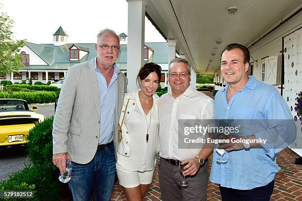 Douglas Clarke, Danielle Casterline, Robert Casterline,and Paul Fusco attend the Douglas Elliman & Hamptons Magazine Celebrate Summer at Campbell...