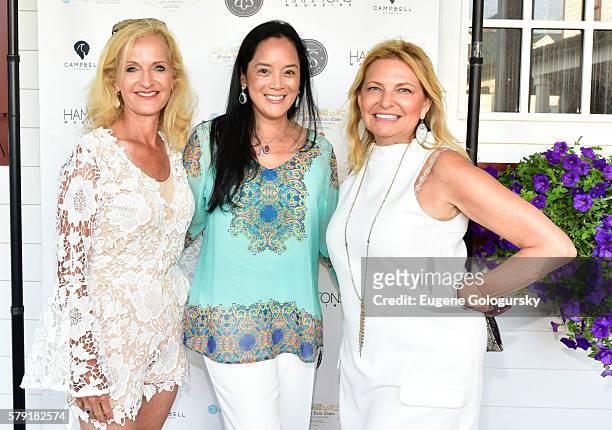 Ann Liguori, Cassandra Seidenfeld, and DebraÊHalpert attend the Douglas Elliman & Hamptons Magazine Celebrate Summer at Campbell Stables on July 22,...
