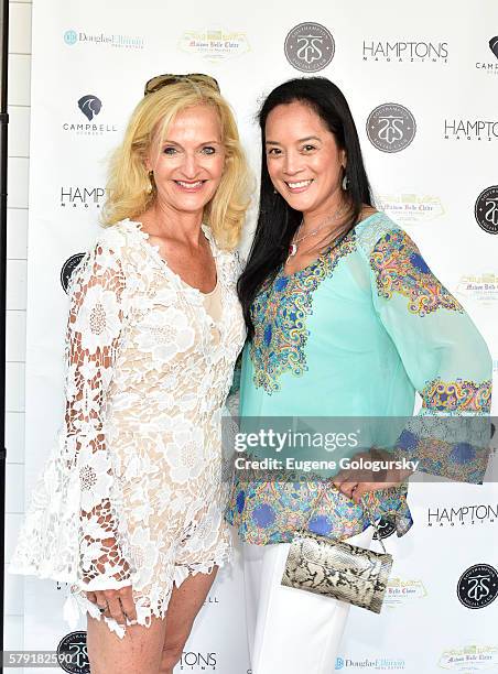 Ann Liguori,and Cassandra SeidenfeldÊ attend the Douglas Elliman & Hamptons Magazine Celebrate Summer at Campbell Stables on July 22, 2016 in...