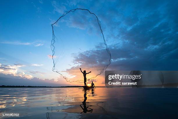 fisherman - catching net stock pictures, royalty-free photos & images