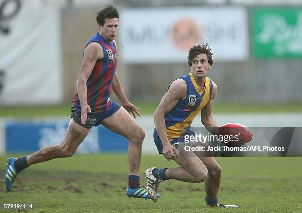 Brayden Monk of Williamstown runs with the ball during the round 16 VFL match between Port Melbourne and Williamstown at North Port Oval on July 23,...