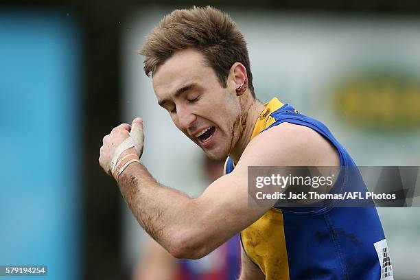 Sam Dunell of Williamstown reacts after missing a goal during the round 16 VFL match between Port Melbourne and Williamstown at North Port Oval on...