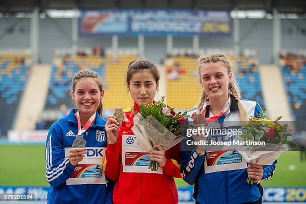 Konstadna Romeou from Greece, Ting Chen from China and Georgiana-Iuliana Anitei from Romania on the podium after the women's triple jump during the...