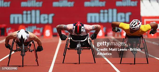 Brent Lakatos of Canada, Mickey Bushell of Great Britain and Ariosvaldo Fernandes Silva of Brazil in action during the Mens 100m T53 race during day...