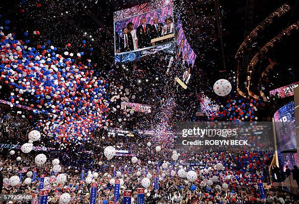 Balloons fall over the crowd as Donald Trump accepts the Republican Party's nomination as presidential candidate, at the end of the Republican...