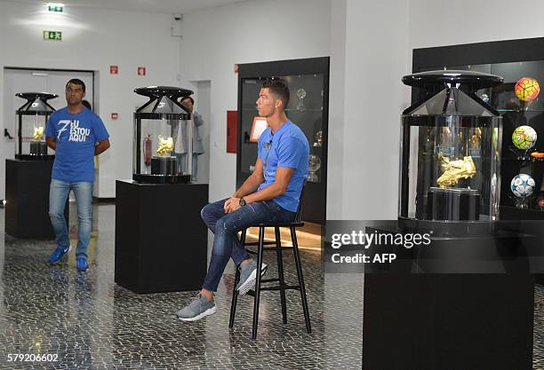 Portugese forward Cristiano Ronaldo and his brother Hugo Aveiro visit the new location of the CR7 museum dedicated Ronaldo's professional career at...