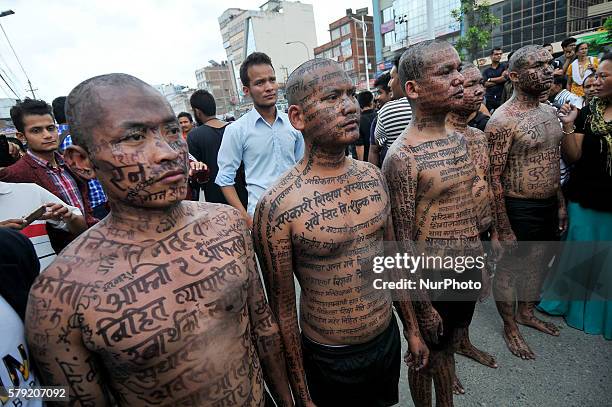 Nepalese visual artists from Artree Nepal performing visual art Protest Culture of Silence' during solidarity to Prof. Dr. Govinda KC at Kathmandu,...