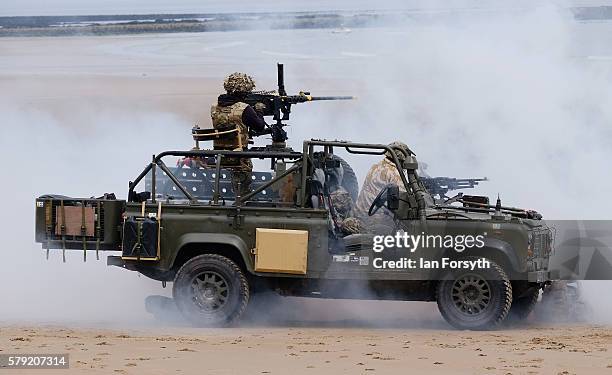 Royal Marines Commandos take part in a simulated beach assault as they entertain crowds during the 28th Sunderland International Air show on July 23,...