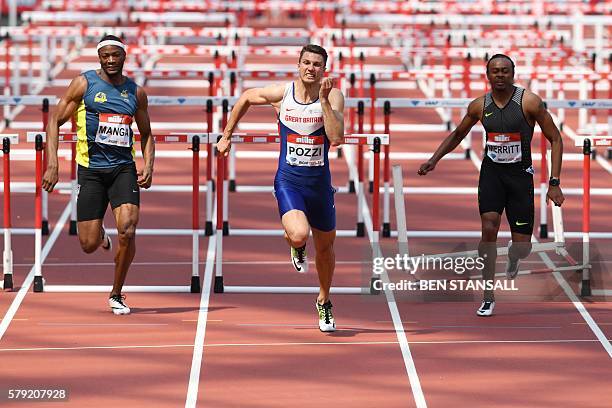 Britain's Andrew Pozzi clears the final hurdle to win the first heat in the men's 110 metres-hurdles ahead of France's Aurel Manga and US athlete...