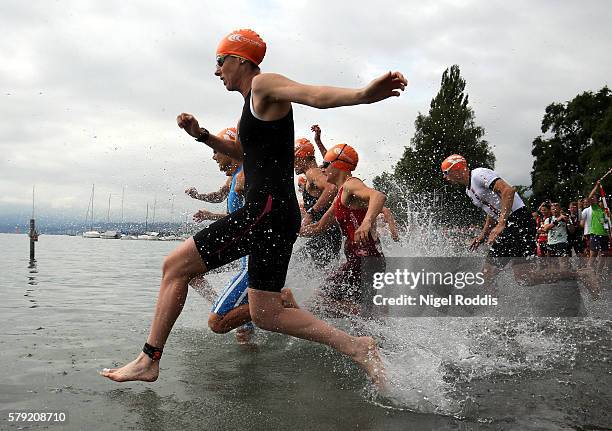 Athletes start the swim section in the 5150 triathlon with Nicola Spirig of Switzerland second on July 23, 2016 in Zurich, Switzerland.