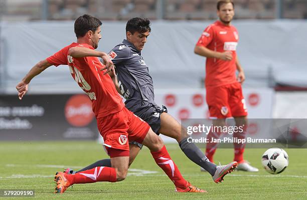 Tim Kruse of FC Energie Cottbus and Eroll Zejnullahu of 1 FC Union Berlin during the test match between FC Energie Cottbus and 1 FC Union Berlin on...