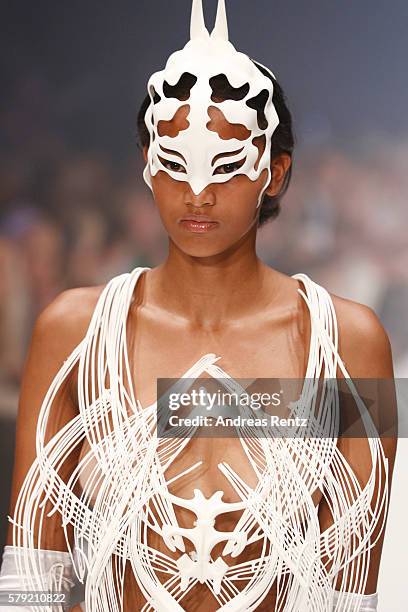 Model walks the runway at the 3D Fashion Presented By Lexus show during Platform Fashion July 2016 at Areal Boehler on July 23, 2016 in Duesseldorf,...