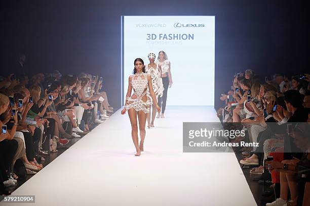 Models walk the runway at the 3D Fashion Presented By Lexus show during Platform Fashion July 2016 at Areal Boehler on July 23, 2016 in Duesseldorf,...