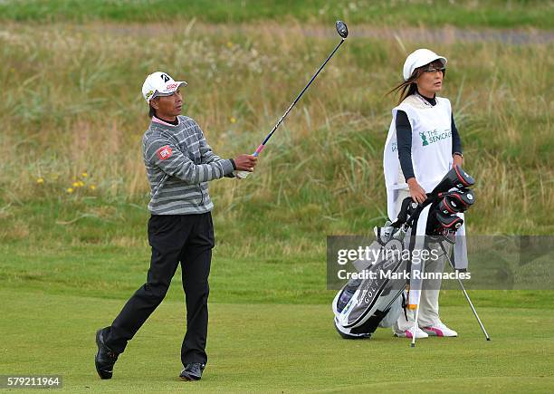 Kohki Idoki of Japan second shot to the 2nd hole during the third day of The Senior Open Championship at Carnoustie Golf Club on July 23, 2016 in...