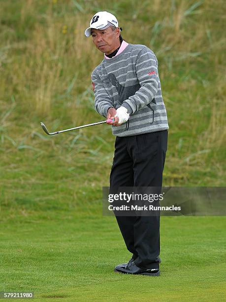 Kohki Idoki of Japan third shot to the 1st hole during the third day of The Senior Open Championship at Carnoustie Golf Club on July 23, 2016 in...