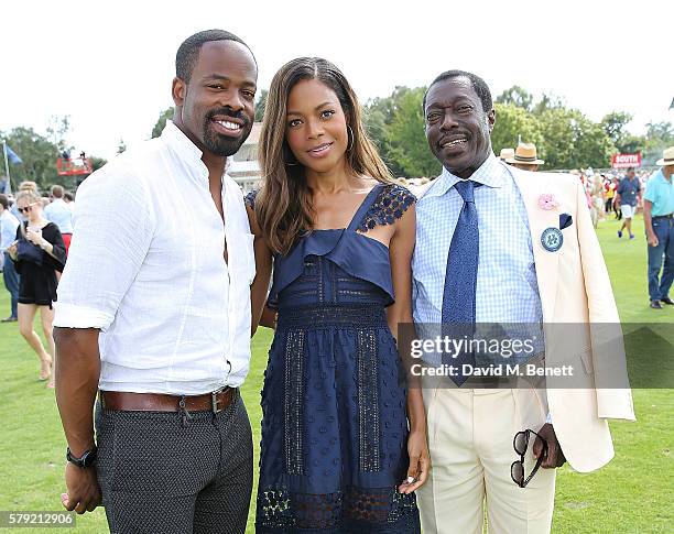 Chike' Okonkwo, Naomie Harris and Prince Albert Esiri attend the Royal Salute Coronation Cup at Guards Polo Club on July 23, 2016 in Egham, England.