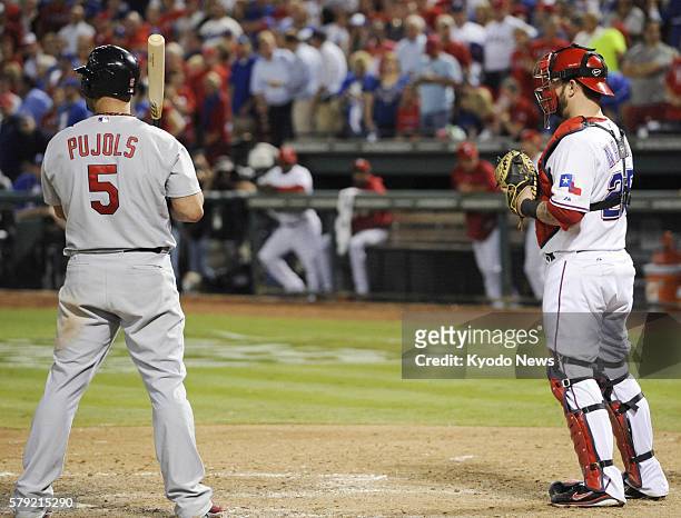 United States - Photo shows St. Louis Cardinals slugger Albert Pujols batting in the seventh inning of Game 5 of the World Series at Rangers Ballpark...