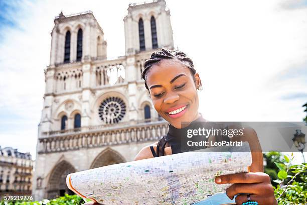 tourist in paris, in notre dame - tourism in paris stock pictures, royalty-free photos & images