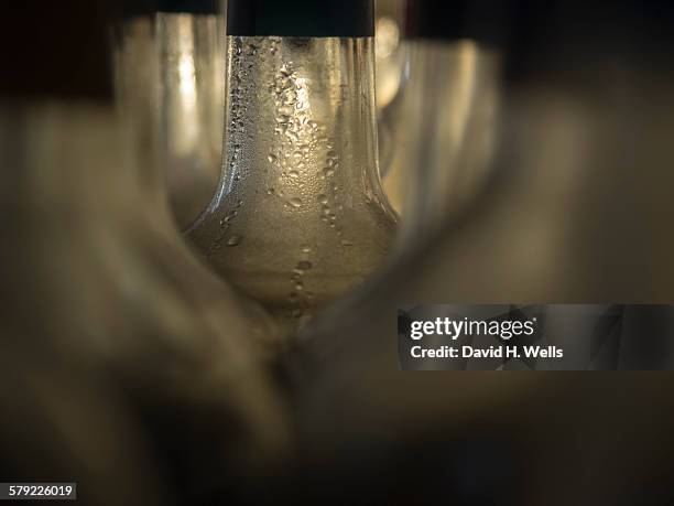 close up of glass bottles - coupeville stock pictures, royalty-free photos & images