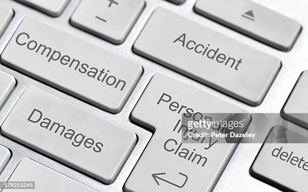 personal injury claim keyboard - peter law foto e immagini stock