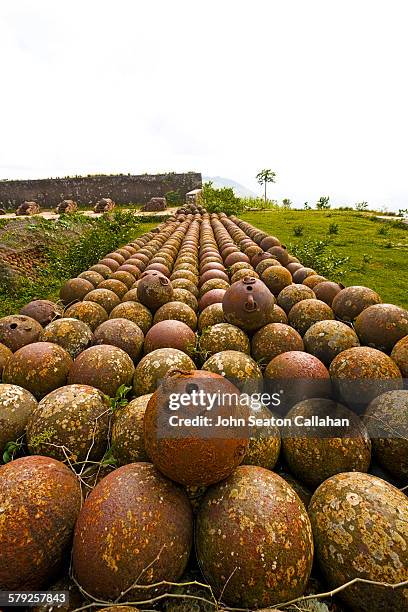 cannonballs at the citadelle laferrière - citadel haiti stock pictures, royalty-free photos & images