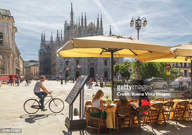 open air restaurant in milan?s cathedral square - milan stock pictures, royalty-free photos & images