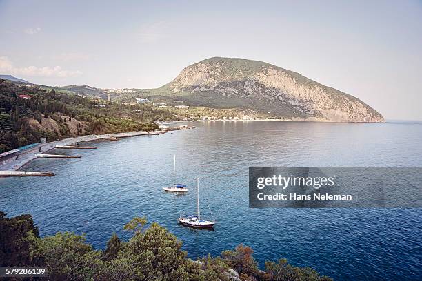 view of boats in the sea, artek, crimea - crimea foto e immagini stock