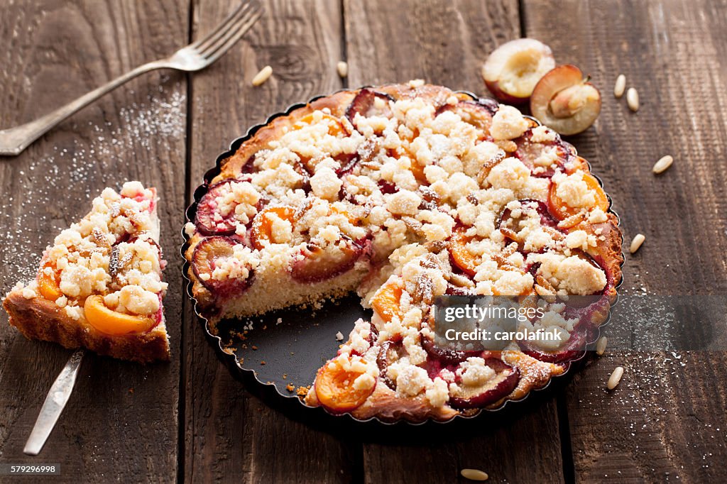 Plum cake with pine nuts