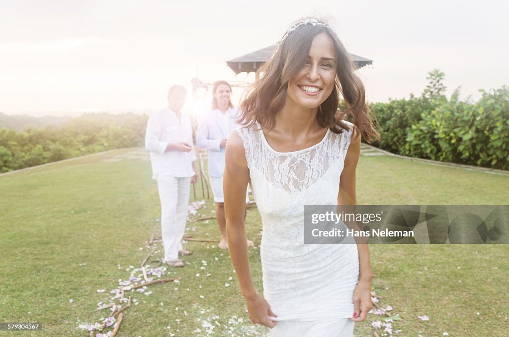 Young bride during wedding reception in gardens