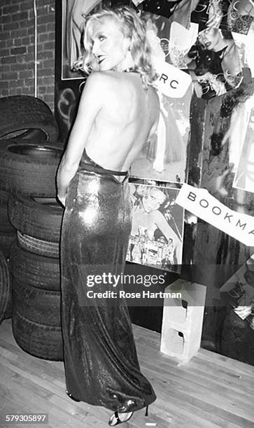 Portrait of an unidentified woman as she poses at the launch party for the book 'Gloss: The Work of Chris von Wangenheim' at the Tunnel, New York,...
