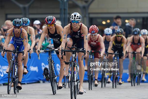 Helen Jenkins of Great Britain and other competitors come to the second transition in the female elite race at the ITU World Triathlon Hamburg on...