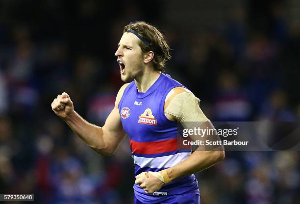 Marcus Bontempelli of the Bulldogs celebrates after kicking a goal during the round 18 AFL match between the Western Bulldogs and the St Kilda Saints...