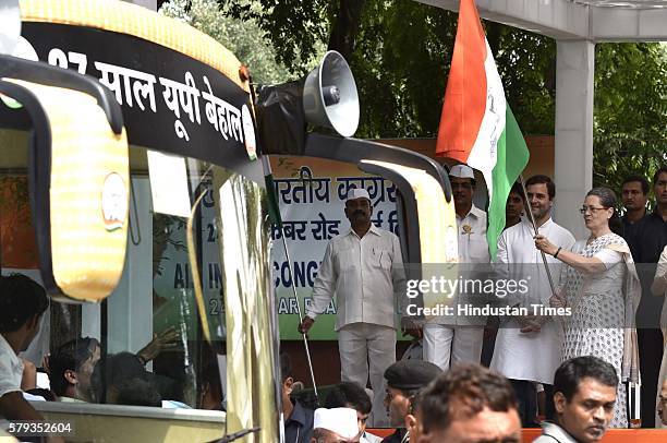 Congress President Sonia Gandhi with Vice President Rahul Gandhi flag off a three-day bus yatra to Uttar Pradesh, formally launching the party’s...