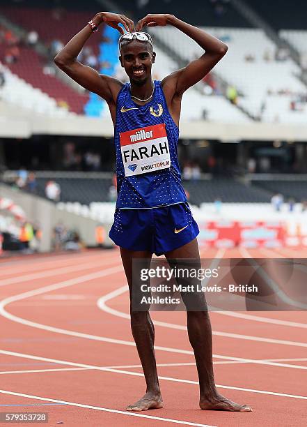 Mo Farah of Great Britain celebrates winning the Mens 5000m during day two of the Muller Anniversary Games at The Stadium - Queen Elizabeth Olympic...