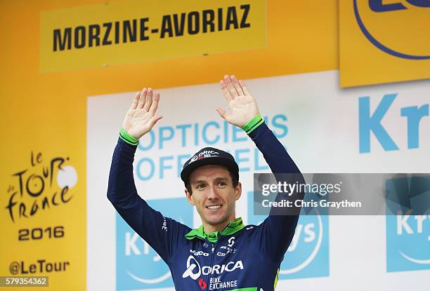 Adam Yates of Great Britain and Orica Greenedge celebrates recieving the White jersey in stage twenty of the 2016 Le Tour de France, from Megeve to...