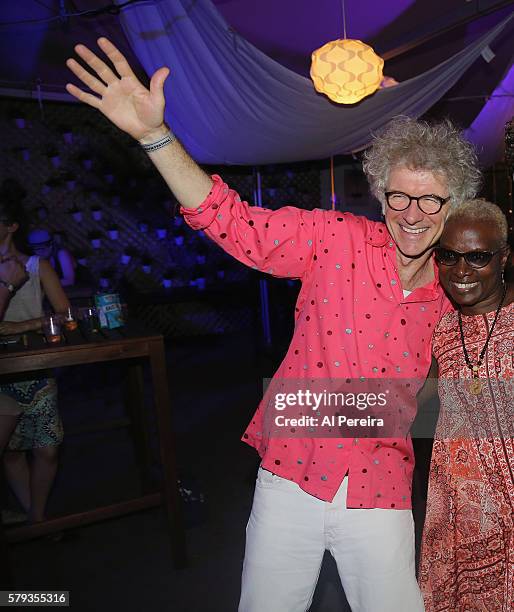 Dan Zanes and Angelique Kidjo appear backstage when Jon Batiste and Stay Human perform at Celebrate Brooklyn! at Prospect Park Bandshell on July 22,...