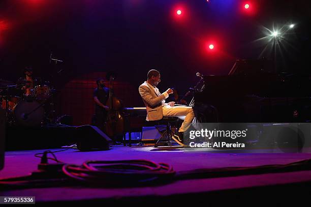 Jon Batiste and Stay Human perform at Celebrate Brooklyn! at Prospect Park Bandshell on July 22, 2016 in New York City.