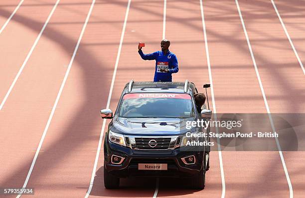 Mo Farah of Great Britain parades around the track during day two of the Muller Anniversary Games at The Stadium - Queen Elizabeth Olympic Park on...