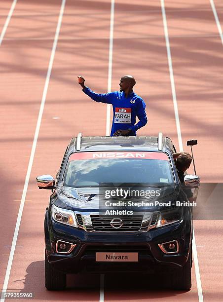 Mo Farah of Great Britain parades around the track during day two of the Muller Anniversary Games at The Stadium - Queen Elizabeth Olympic Park on...