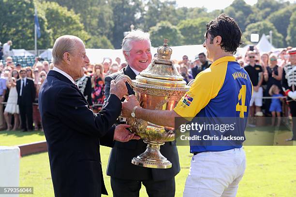 Peter Moore, Global Prestige Brand Director of Royal Salute, Prince Philip, Duke of Edinburgh and Fred Mannix attend the Royal Salute Coronation Cup...