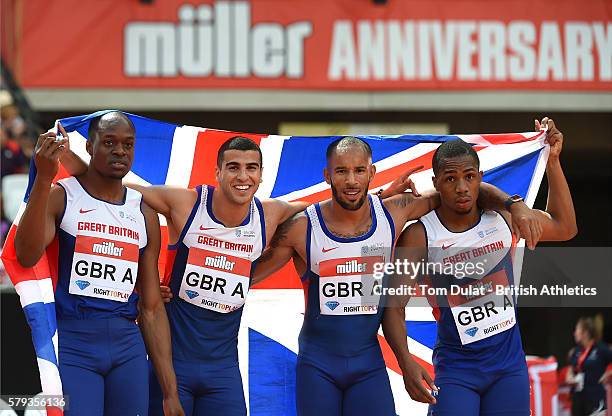 James Elliington, Adam Gemili, CJ Ujah and James Dasaolu of Great Britain pose for photos after winning the Mens 4x100m relay during day two of the...